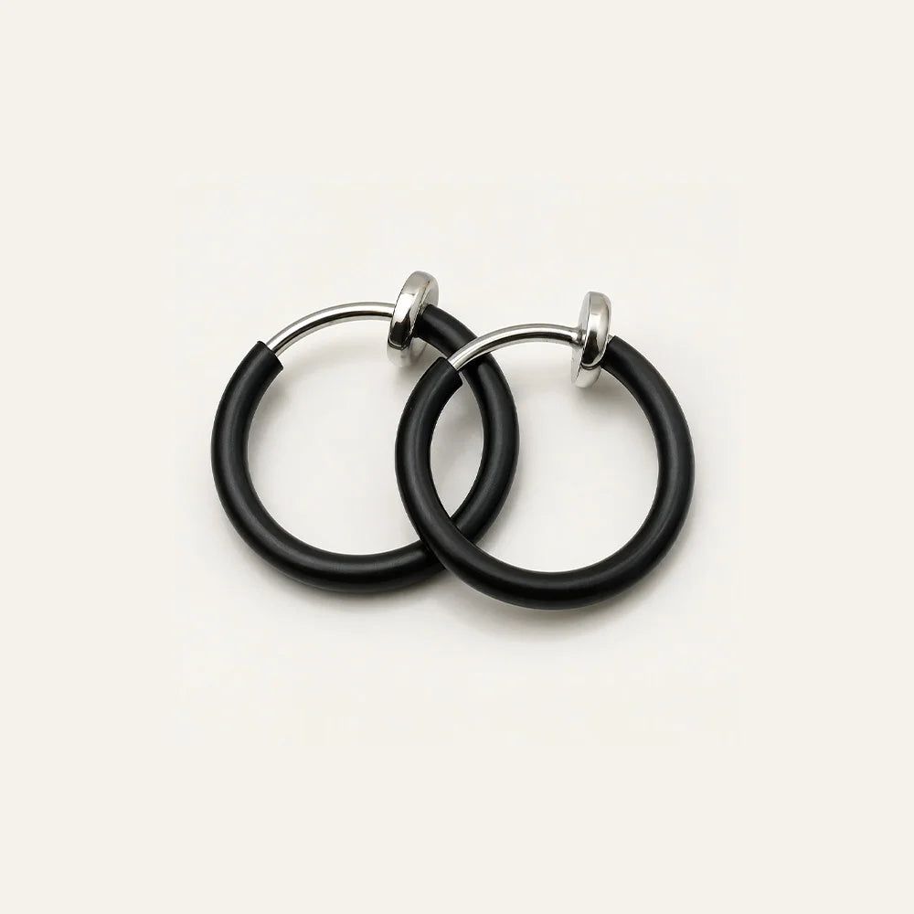Black mini hoop clip-on earrings with silver-tone findings displayed on white background