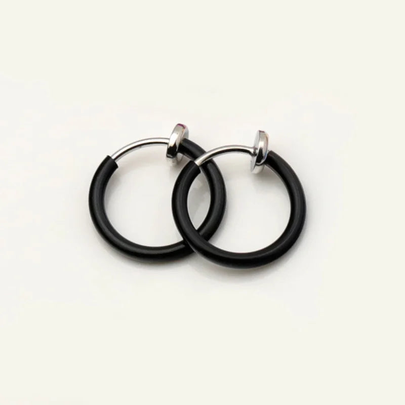 Black mini hoop clip-on earrings with silver-tone findings displayed on white background
