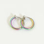 Iridescent mini hoop clip-on earrings front view on white background, rainbow colored metal hoops