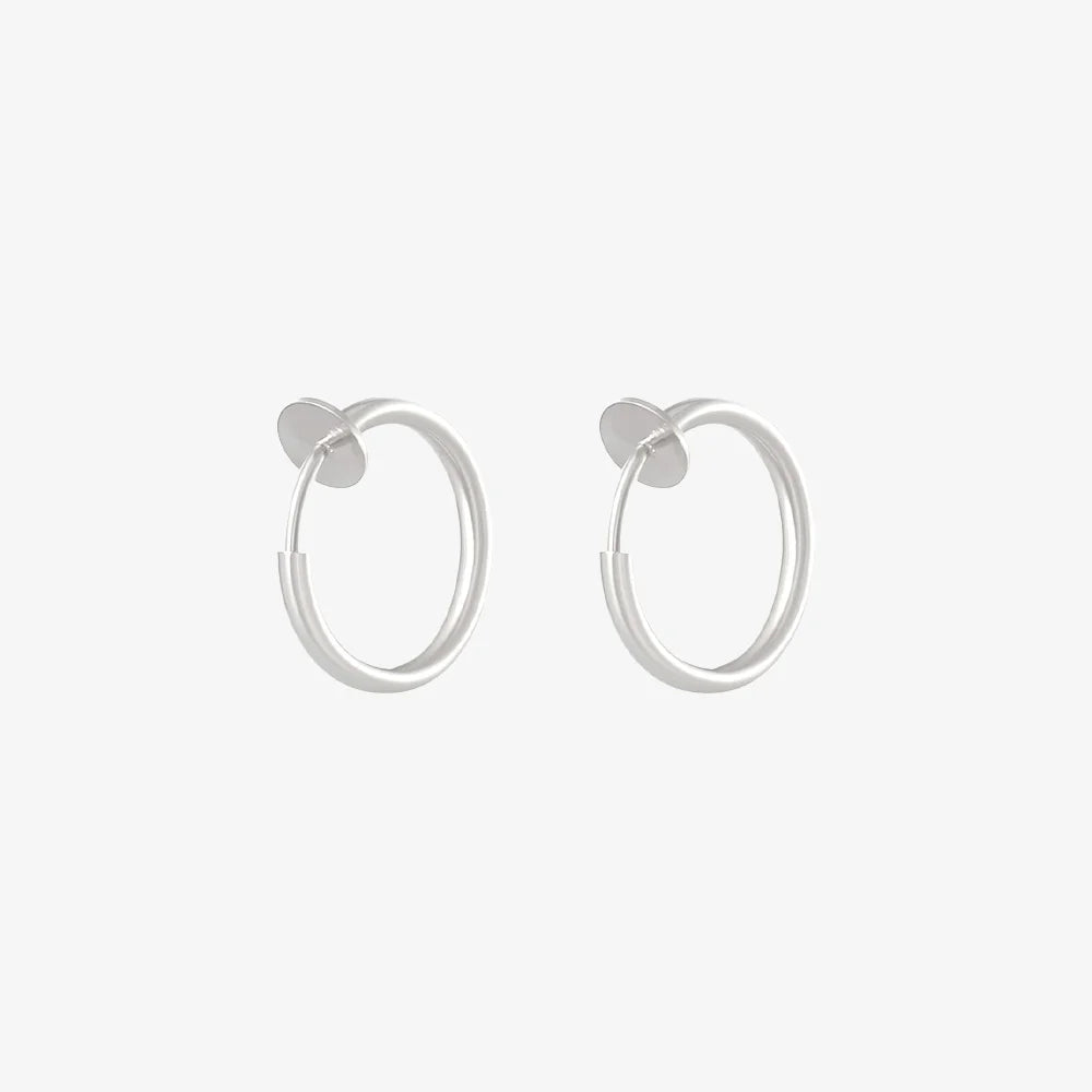 Silver mini hoop clip on earrings front view on white background