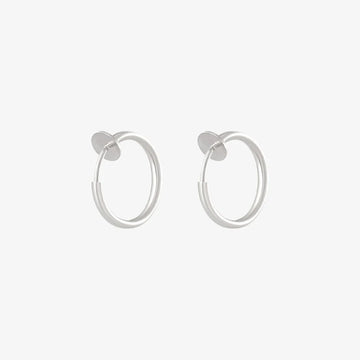 Silver mini hoop clip on earrings front view on white background