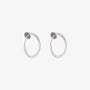White mini hoop clip-on earrings front view on light background, showing pair of circular earrings with metallic posts