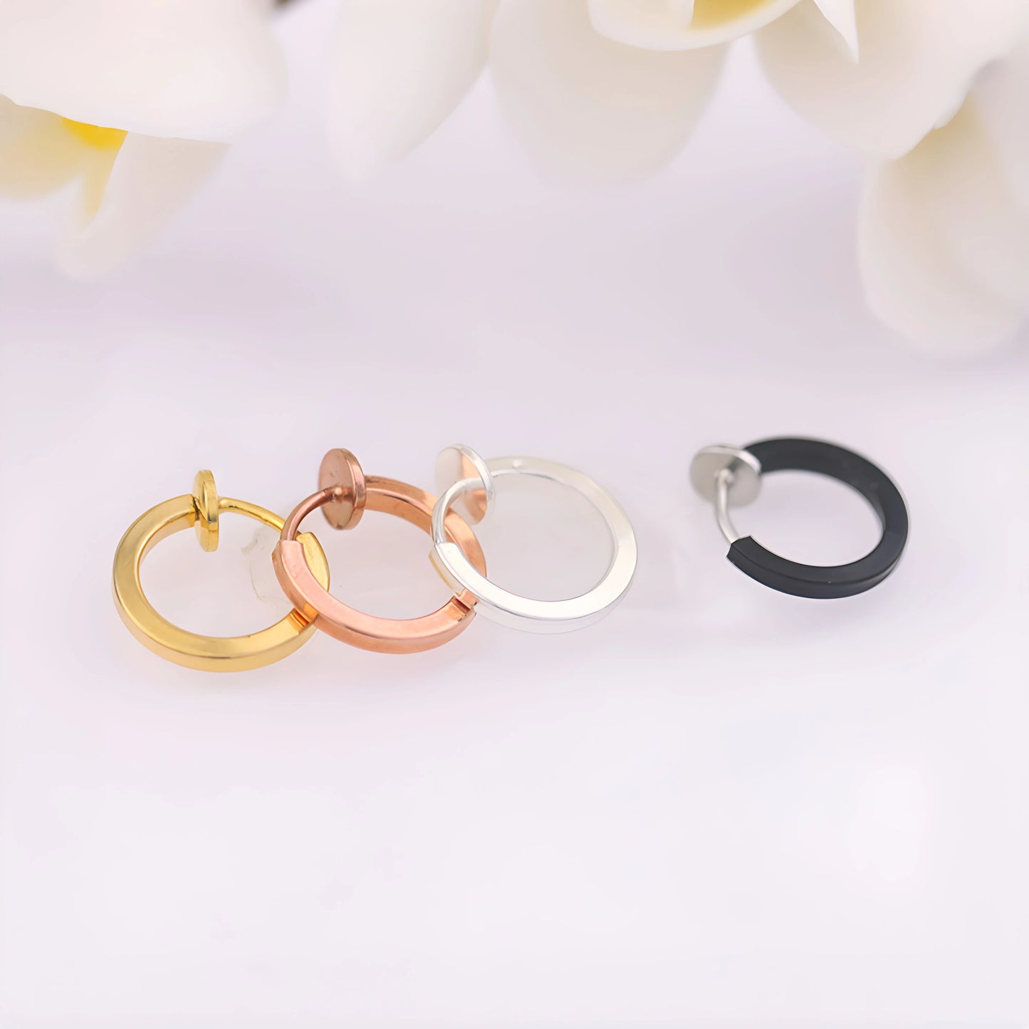 Lightweight and stylish Mini Clip-On Hoop Earrings for men, available in 13mm and 15mm diameter options.