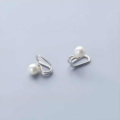 Pearl Ear Cuff on display