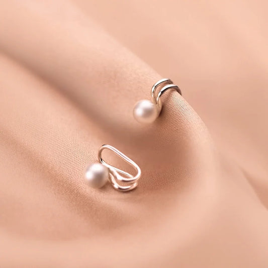 Side view of Sterling Silver Pearl Ear Cuff