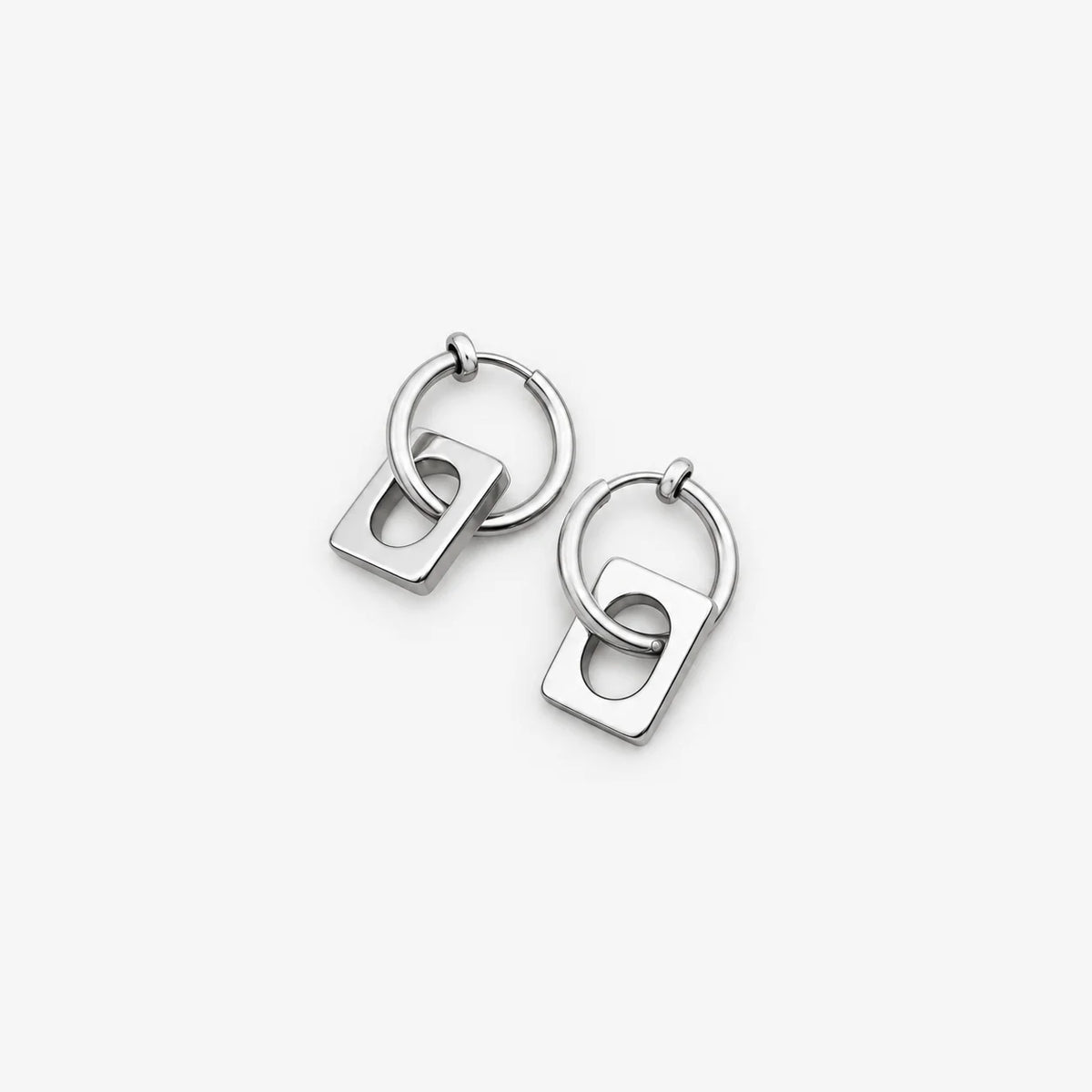Silver modern minimalist square clip-on earrings displayed on clean white background, front view angle