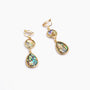 Gold abalone shell teardrop clip-on earrings with iridescent multi-colored shells on white background