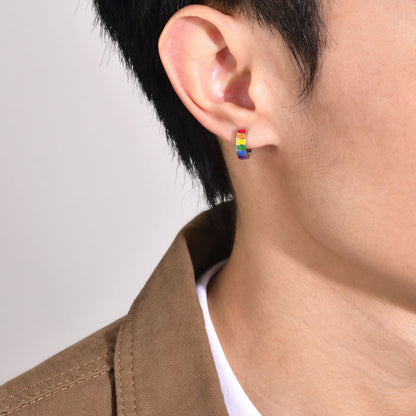 Silver hoop earrings with rainbow stripes, a bold fashion statement and a meaningful gift for LGBT friends and allies. These pride-inspired earrings celebrate love and diversity.