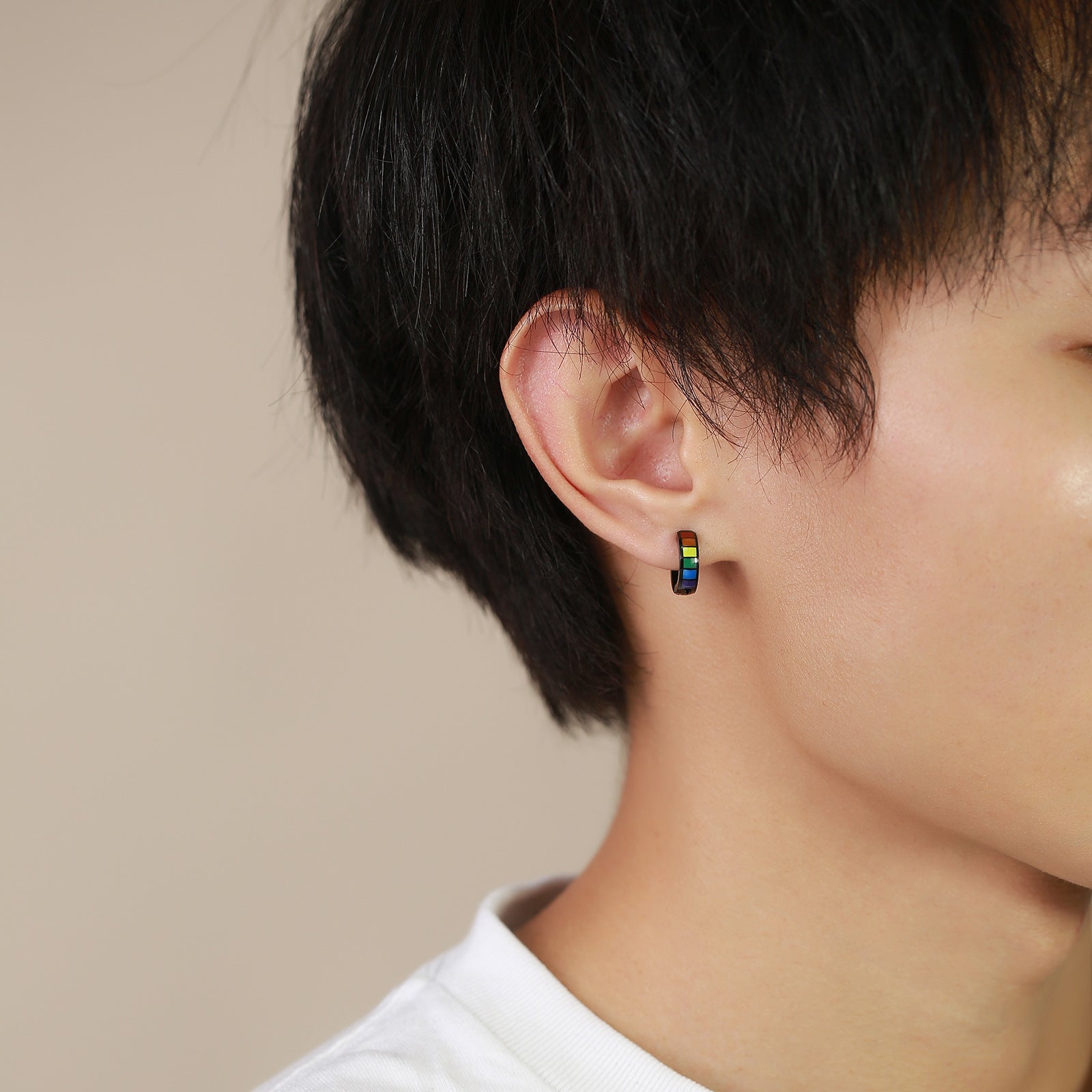 Black hoop earrings with rainbow stripes, a bold fashion statement and a meaningful gift for LGBT friends and allies. These pride-inspired earrings celebrate love and diversity.