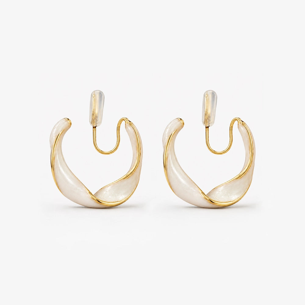 Pearlescent Wave Clip-On Hoop Earrings — pair in gold and cream, front view on white background