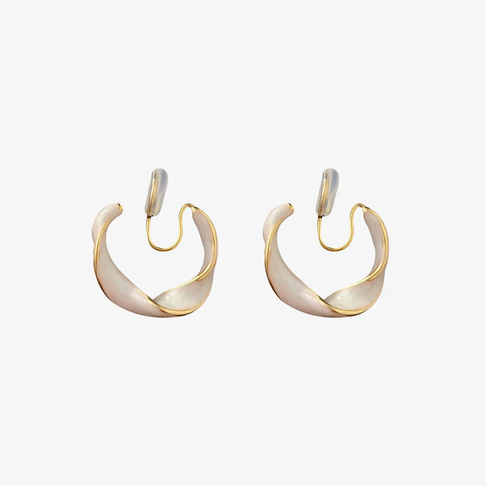 Pearlescent Wave Clip-On Hoop Earrings in gold and cream, front view on white background