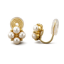 A pair of gold and pearl stud earrings shown on a clean white background, with one earring facing forward to display the flower-like pearl cluster and the other showing the side and back U-type mechanism.