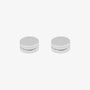 Pair of matte silver round magnetic ear studs for men, crafted from durable stainless steel.