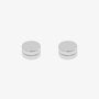 Close-up of stainless steel matte silver magnetic stud earrings, showing its smooth, non-piercing design.