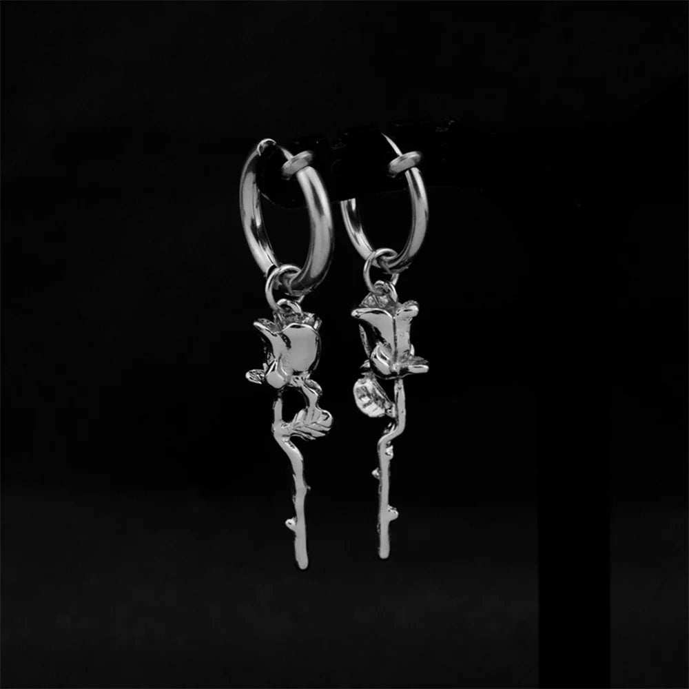 Showcase of Rose Vine Clip-On Hoop Earrings with rose vine detail.