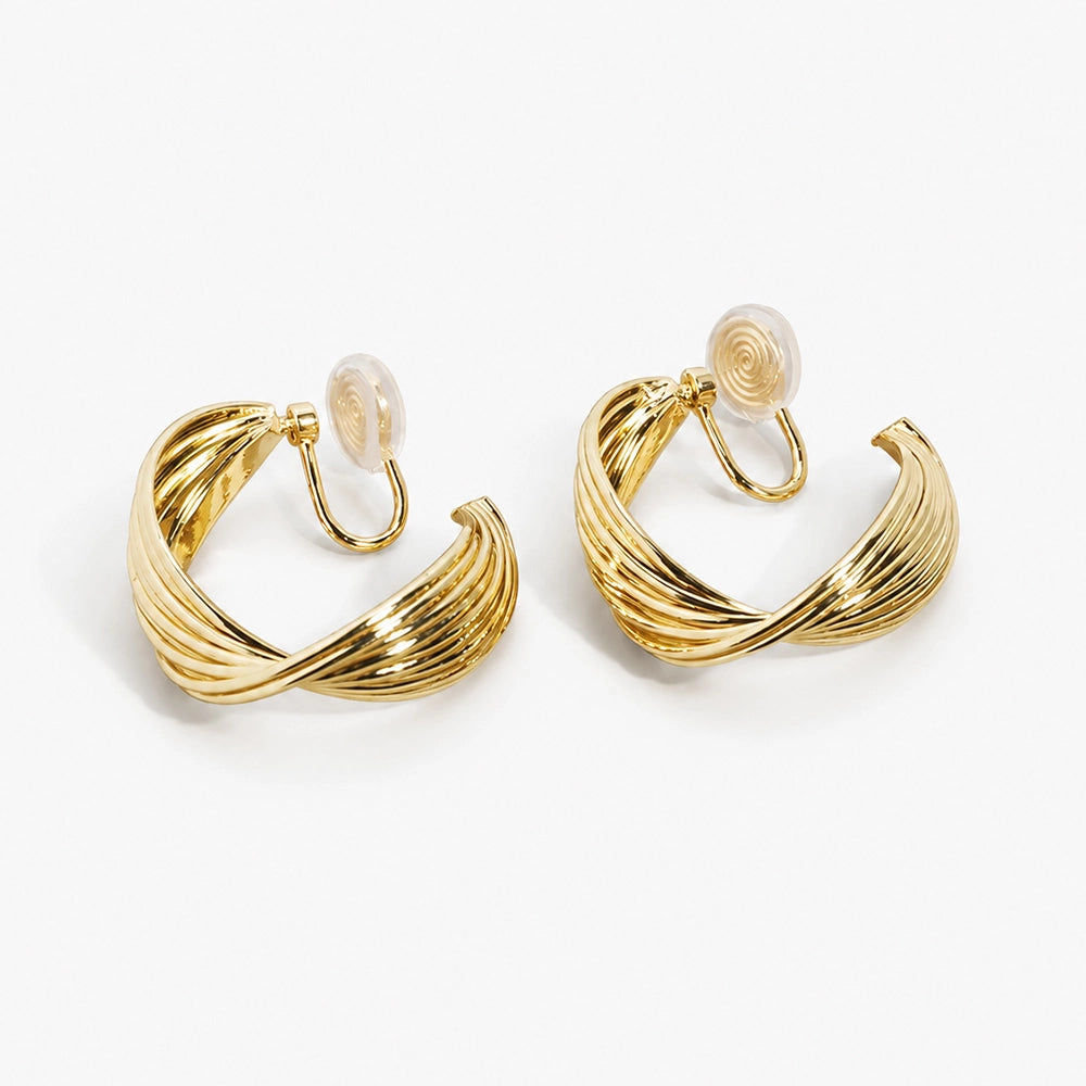 Gold rotating spiral clip-on hoop earrings with moonstone tops displayed in white background