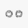 A pair of silver magnetic hoop earrings made from titanium steel.