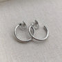 these earrings feature an innovative rotating mechanism