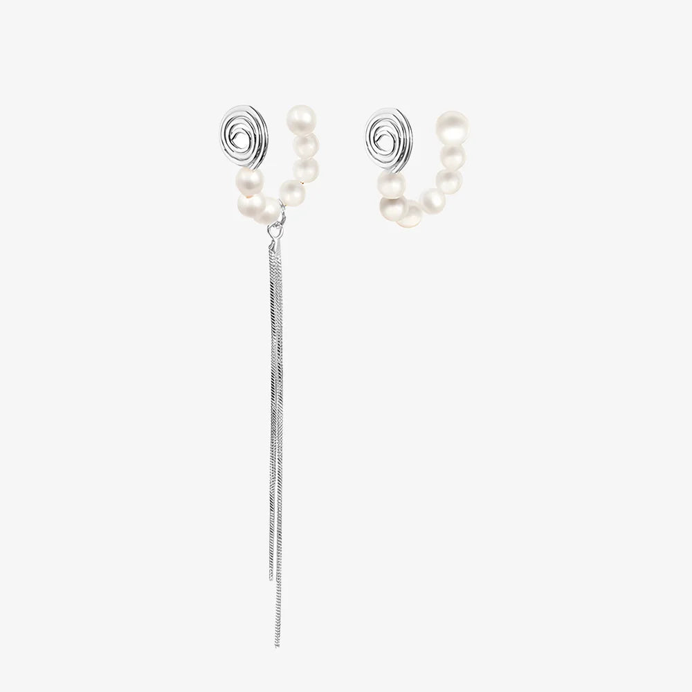 Elegant pearl ear cuff in silver with a tassel, ideal for formal events and weddings.