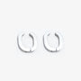 Pair of Silver Horseshoe Clip-On Hoop Earrings displayed on a white background.