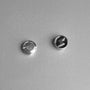 Silver lightning bolt magnetic stud earrings displayed front view on white background showing both studs