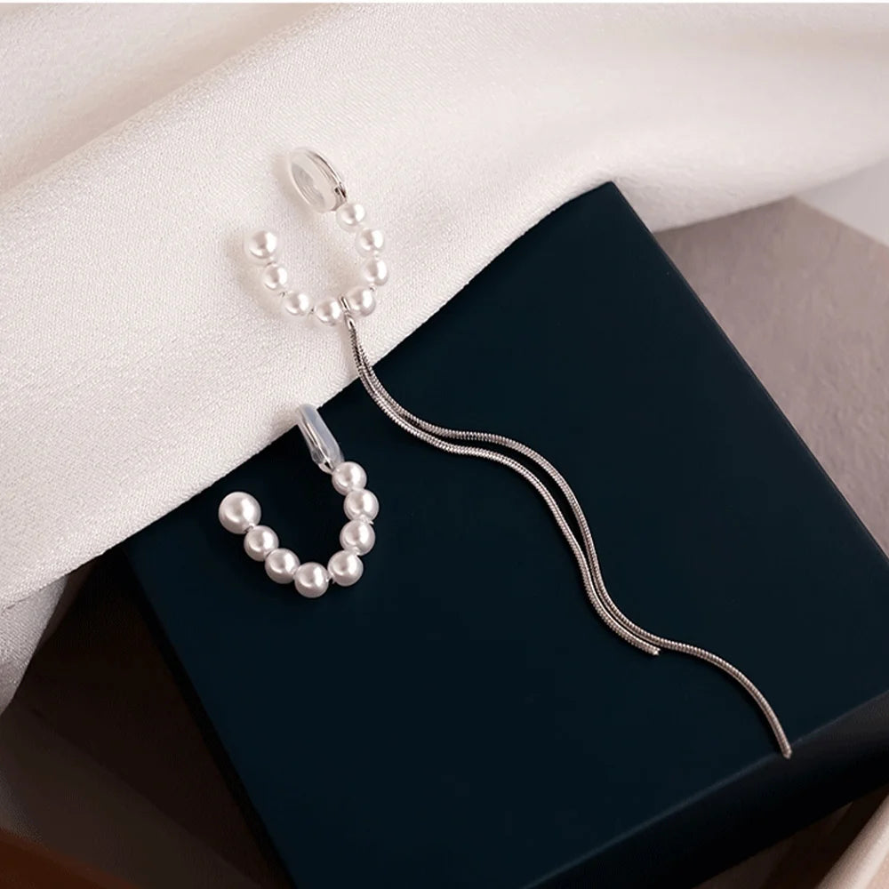 Versatile clip on pearl earrings set with one tassel cuff and one simple cuff, 95mm in length.