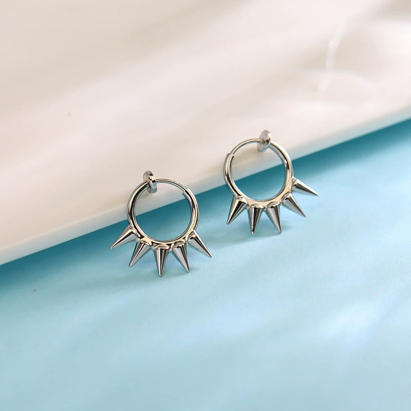 Side view of Silver Spike Hoop Clip-On Earrings showcasing spiked design.