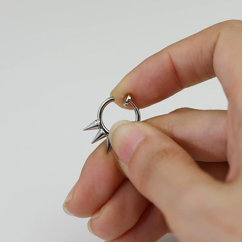 Detail shot of the clip-on mechanism of Silver Spike Hoop Clip-On Earrings.