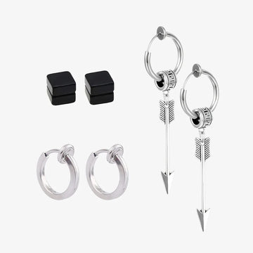 Silver Strength Trio Clip-On Earring Set displayed on white background featuring black studs, silver hoops, and arrow charm earrings