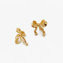 Gold simple bow clip on stud earrings displayed at angle on white background showing detailed design and shine