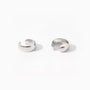 Sleek silver conch ear cuffs displayed front and side view on white background