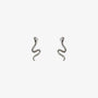 Silvery snake invisible clip-on stud earrings front view on white background