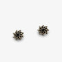 A pair of antique bronze spiral stud earrings with a small black center, displayed on a clean white background.