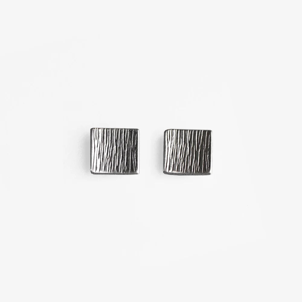  pair of Sterling Silver Tree Bark Texture Square Magnetic Earrings featuring a rugged, textured finish and secure magnetic closure.