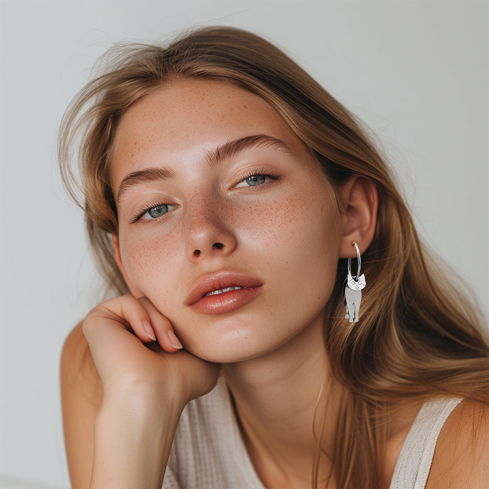 Show off your love for felines with our Stainless Steel Cat Clip-On Earrings, offering a secure and stylish addition to your jewelry collection.