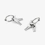A pair of silver-toned hoop earrings with minimalist cat-shaped charms, displayed on a clean, light gray background.