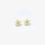 A pair of small star-shaped stud earrings with a pale yellow and white textured design, shown on a plain white background.