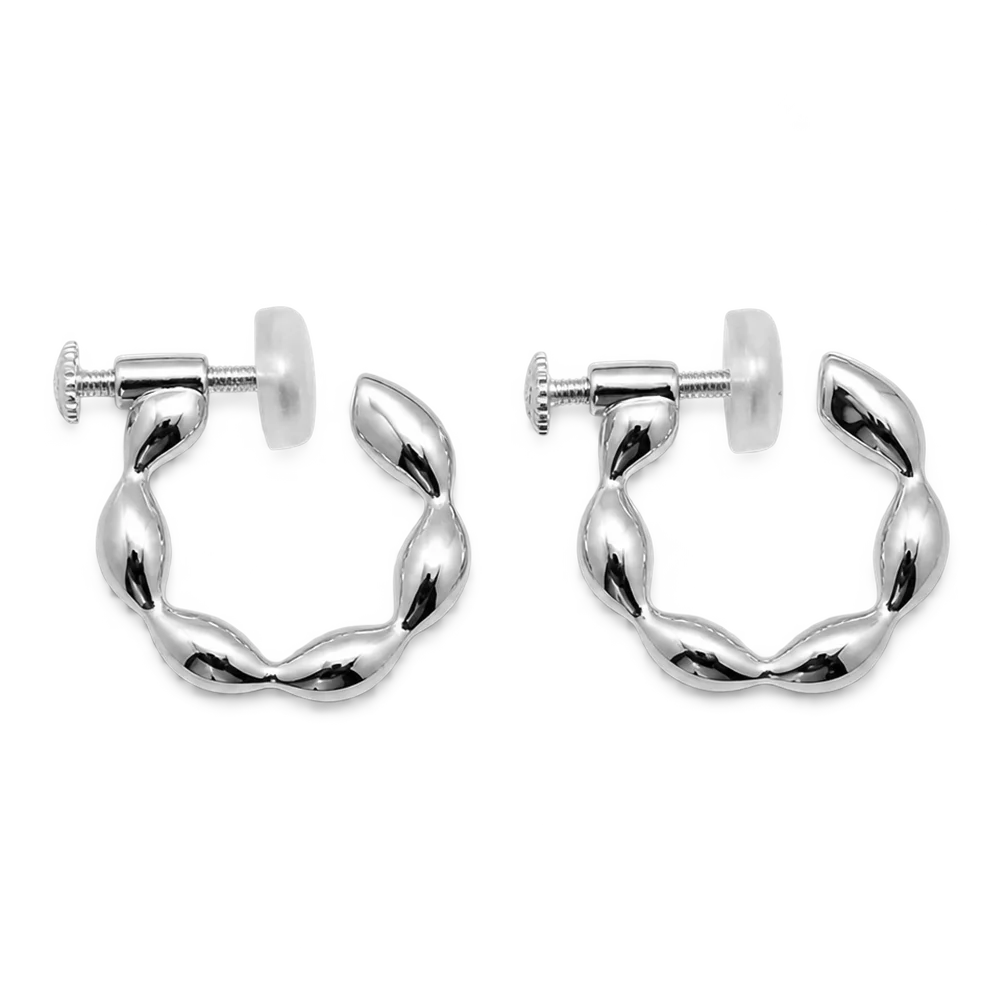 A pair of silver huggie hoop earrings with a twisted, wavy design, displayed on a clean white background.