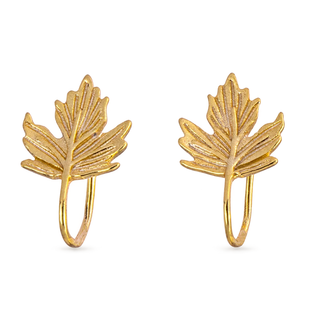 A pair of gold maple leaf hoop earrings with a textured, hammered finish, displayed on a clean white background.