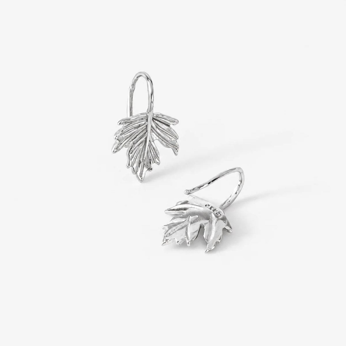 sterling silver maple leaf clip earrings displayed, front and back view showing detailed leaf design
