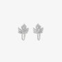 Pair of Sterling Silver Maple Leaf Cuff Earrings in White Gold displayed on a soft beige background.