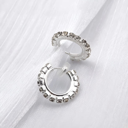 Lightweight silver hoop clip-on earrings with sparkling synthetic diamonds, 18mm diameter.