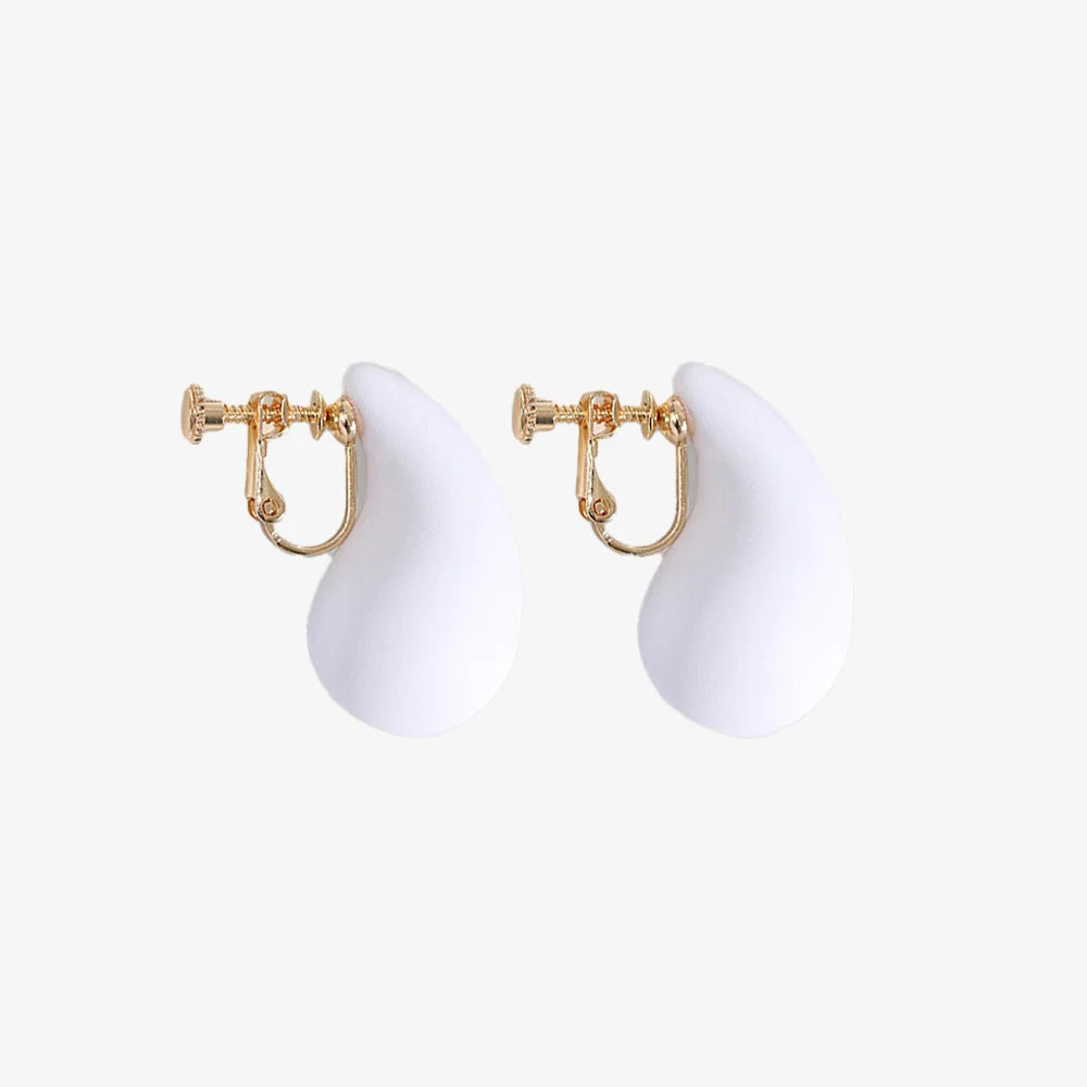 Detailed view of Teardrop Clip-On Earring in White, highlighting the sleek and elegant finish.