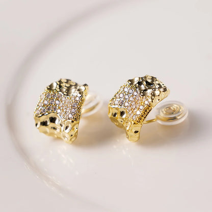 Side view of Textured Gold & Pavé Clip-On Stud Earrings highlighting the 16k gold plating and craftsmanship.