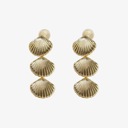 Front view of Textured Shell Clip-On Earrings in Gold showcasing the intricate shell-inspired texture.