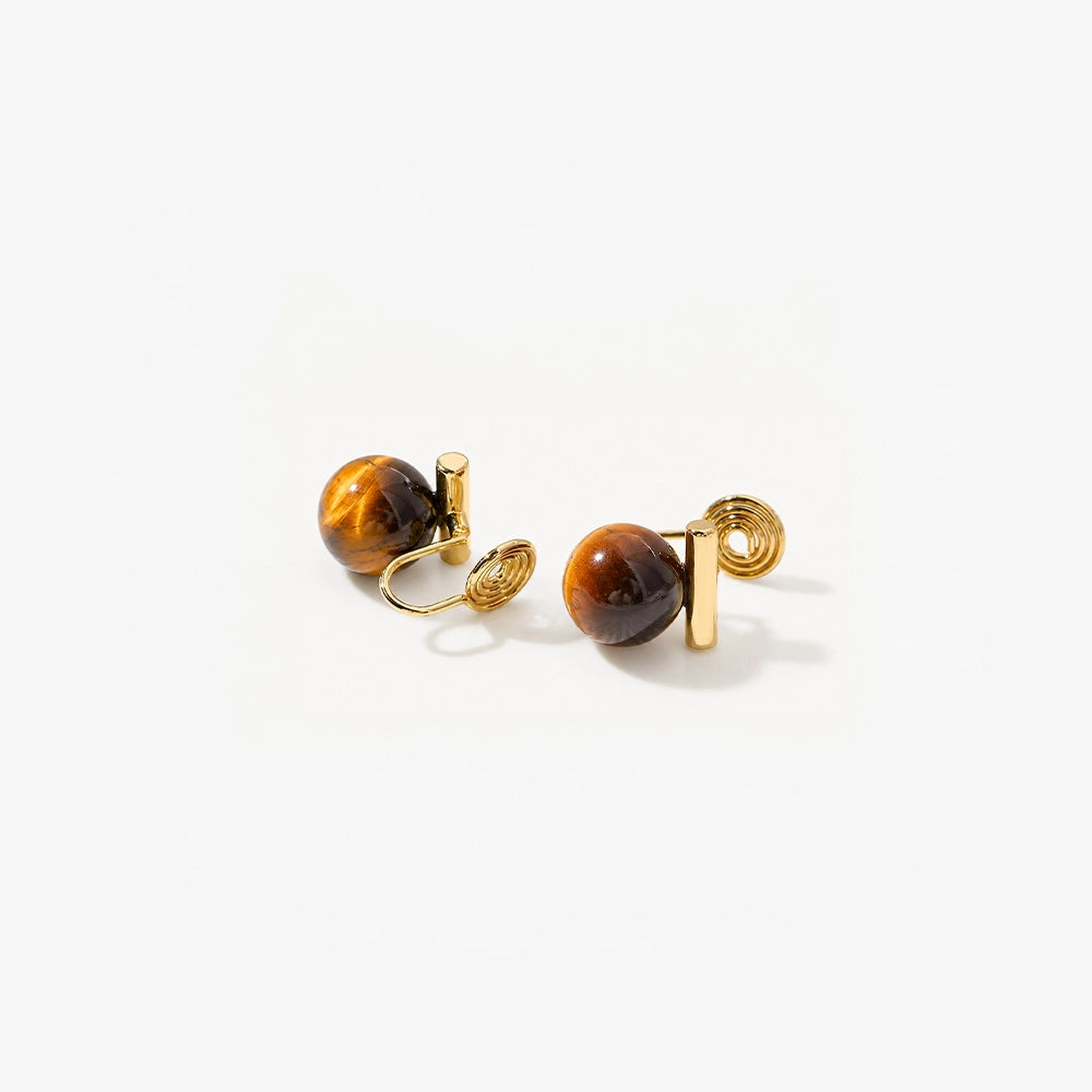 Tiger's Eye Clip On Earrings with gold spiral details, front view on white background