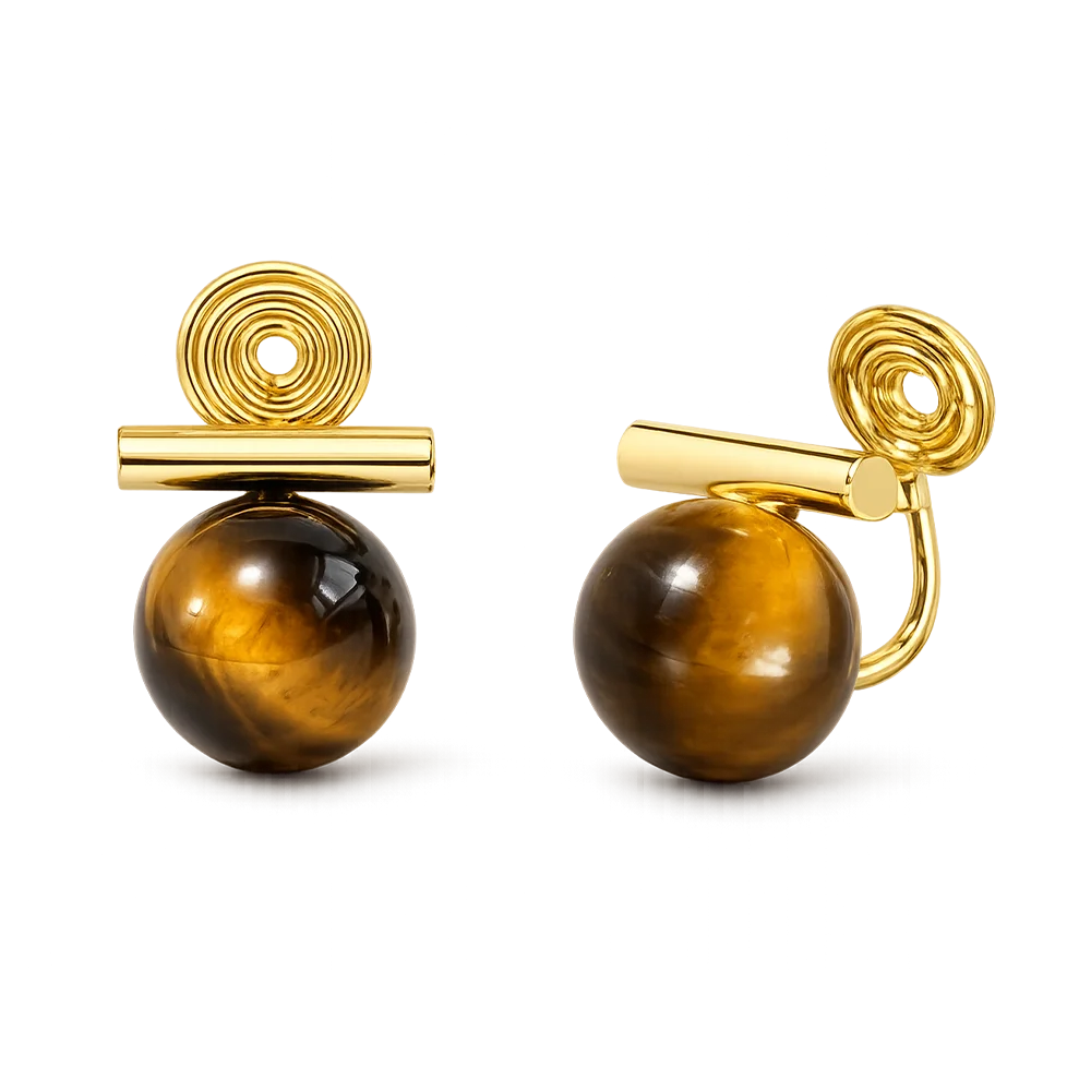 A pair of gold and tiger's eye stud earrings on a clean white background. Each earring features a polished round brown tiger's eye stone with a bar.