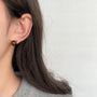 Tiger's Eye Clip On Earrings side view on model with dark hair showing warm brown stone detail