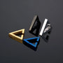 Geometric Triangle Clip-On Earrings in Silver displayed in four metallic finishes including gold, black, and blue on gray background