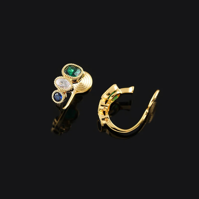 Gold triple color rhinestone emerald clip-on earrings with green, white and blue stones, shown from front and side view on black background